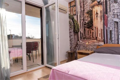 Postel nebo postele na pokoji v ubytování Apartments Pilicari