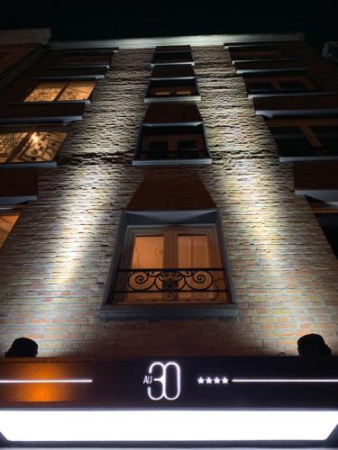 a building with a window on the side of it at Au 30 Lille Centre Grand Palais in Lille