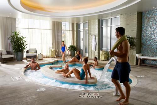 a group of people in a swimming pool in a hotel at Lodge Kohler in Green Bay