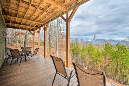 a porch with chairs and a table with a view at Hiawassee Home with Views Less Than 1 Mi to Lake Chatuge in Hiawassee