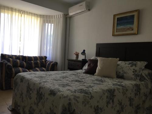Postel nebo postele na pokoji v ubytování Arsamici Hotel