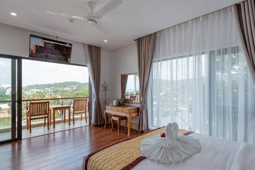Giường trong phòng chung tại Villa Caribe