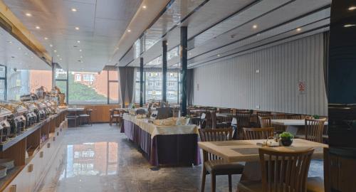 Posezení v ubytování Paco Hotel Tianpingjia Metro Guangzhou