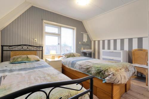 Ένα ή περισσότερα κρεβάτια σε δωμάτιο στο Ons Zeeuws Huus