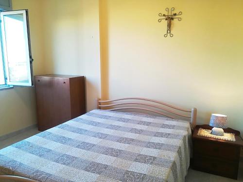 A bed or beds in a room at Near The Beach And The Center Of Otranto - Apartment Eleonora 5 Places