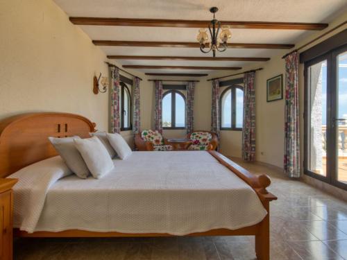 Voodi või voodid majutusasutuse Seaview Villa Balcon al Mar Javea toas
