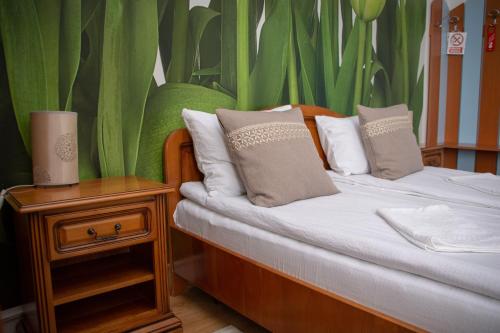 Postel nebo postele na pokoji v ubytování Motel Via Targu Mures
