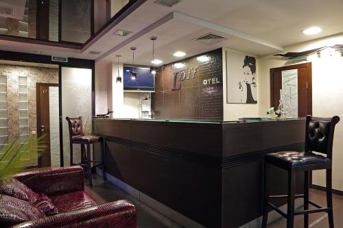 The lobby or reception area at Loff Hotel