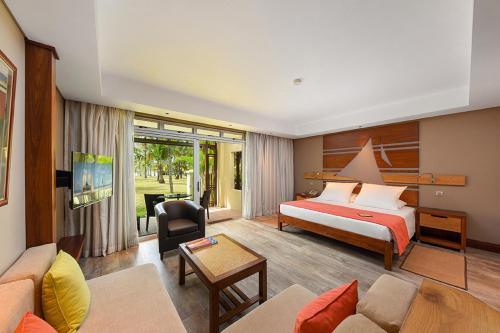 Кровать или кровати в номере Shandrani Beachcomber Resort & Spa