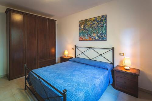 En eller flere senge i et værelse på Matteo's Apartments