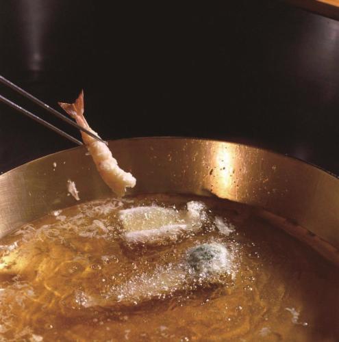 a pot of soup with a piece of food in it at Hotel New Otani Tokyo Garden Tower in Tokyo