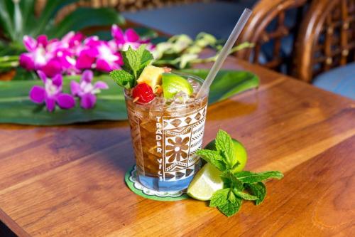 a drink sitting on top of a wooden table at Hotel New Otani Tokyo Garden Tower in Tokyo