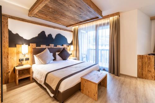 Postel nebo postele na pokoji v ubytování Lady Maria Hotel Wellness & Resort