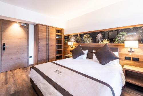 Postel nebo postele na pokoji v ubytování Lady Maria Hotel Wellness & Resort
