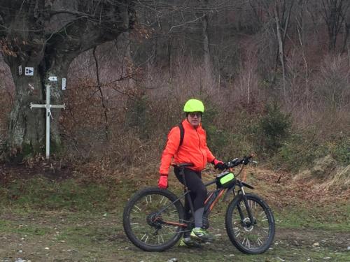 a man in a helmet riding a bike at La Milardière Chambres d'Hôtes in Theux