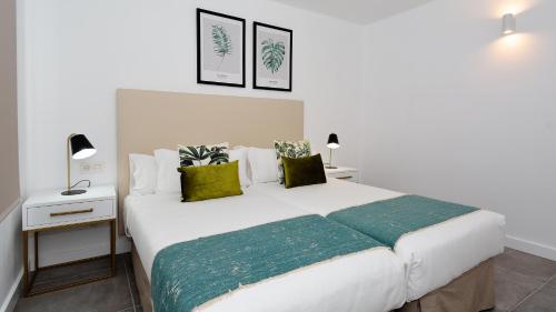 Postel nebo postele na pokoji v ubytování Loft Diamond Costa Teguise with Pool