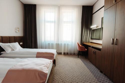 Ένα ή περισσότερα κρεβάτια σε δωμάτιο στο Roa Guesthouse