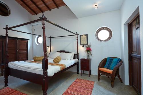 A bed or beds in a room at Villa Sunbird