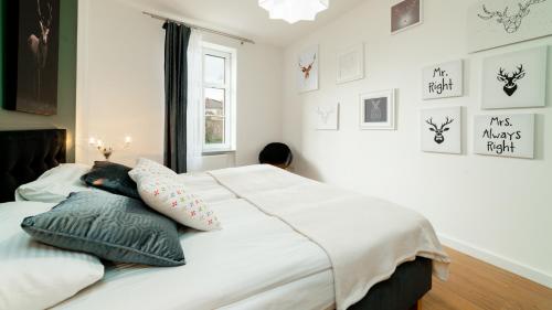 Posteľ alebo postele v izbe v ubytovaní Apartamenty EverySky - Górna 8
