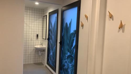 Vonios kambarys apgyvendinimo įstaigoje AZ The Botanic Hostel