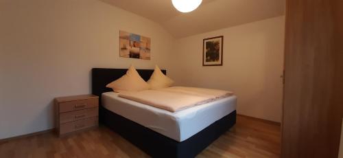 Postel nebo postele na pokoji v ubytování Ferienwohnung am Junkerbült