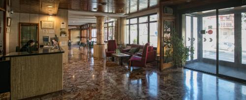 El vestíbulo o zona de recepción de Hotel Odon
