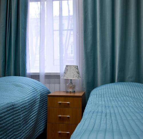 Cama o camas de una habitación en Bon-Appart on Bolshaya Morskaya 31 - Irena Guest House