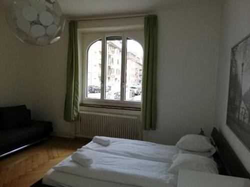 Un ou plusieurs lits dans un hébergement de l'établissement ZüriZimmer