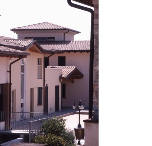 a row of houses with roofs at Il Colombaro in Salò