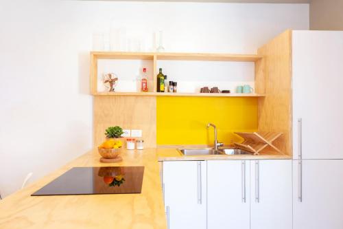 Kuchyňa alebo kuchynka v ubytovaní Mercato di Ortigia Apartments