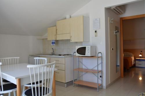 Dapur atau dapur kecil di Residence Chiara