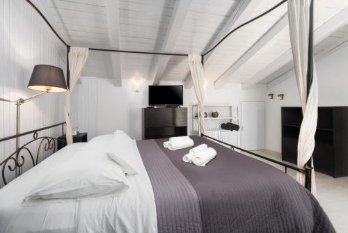 Llit o llits en una habitació de Apartments and rooms Villa Bori