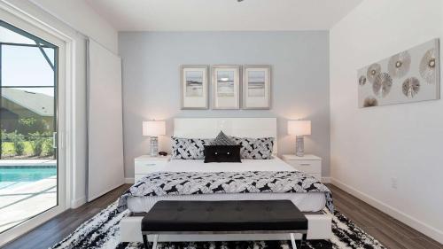Un pat sau paturi într-o cameră la Paradise at Providence - Exclusive 4 bed pool home