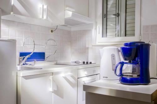 Kuchyň nebo kuchyňský kout v ubytování Apartments IDa II