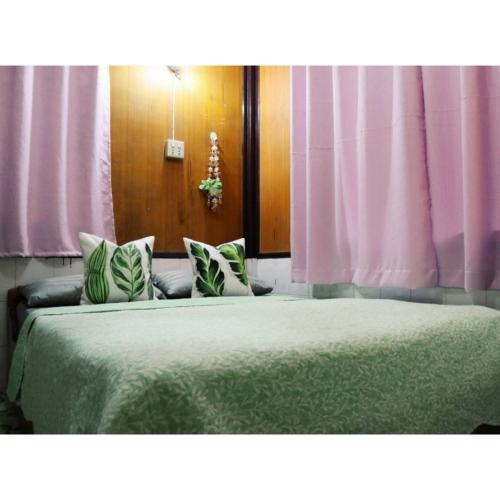 Ένα ή περισσότερα κρεβάτια σε δωμάτιο στο Small Guest House Koh Kood