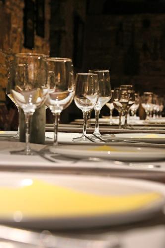 a group of wine glasses sitting on a table at Princess Lanassa in Kostitsi