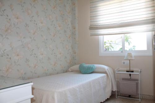 Posteľ alebo postele v izbe v ubytovaní APARTAMENTO SAN NICOLAS