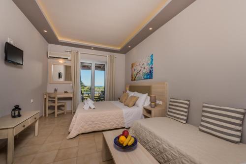 Кровать или кровати в номере Katerina Rooms
