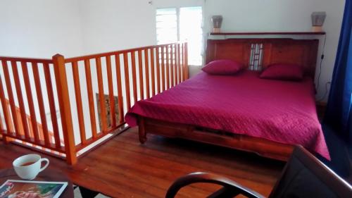 Een bed of bedden in een kamer bij Maison CÉCILIA