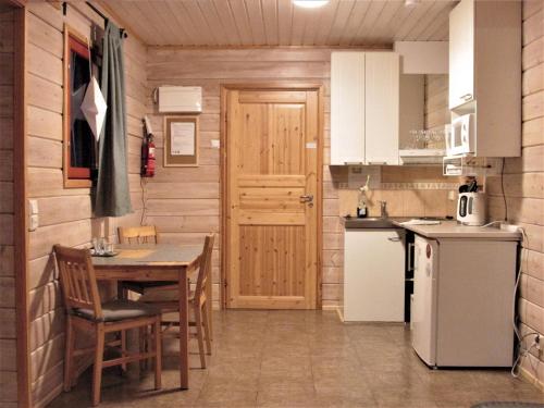 Η κουζίνα ή μικρή κουζίνα στο Scandinavian Dream Cottages Vikajarvi- Rovaniemi