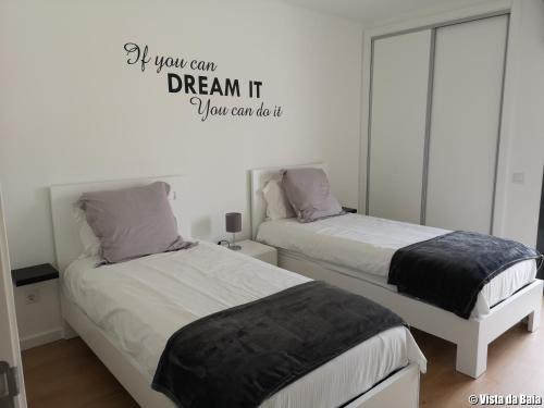Un pat sau paturi într-o cameră la Vista da Baia