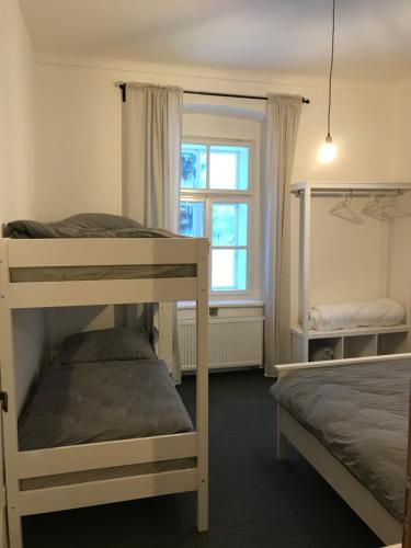 Postel nebo postele na pokoji v ubytování Stará Škola Hedeč