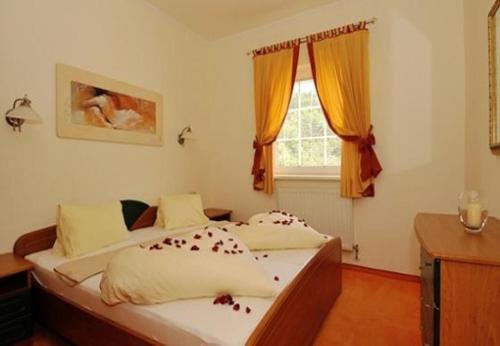 a bedroom with a bed and a window at Apartments Martin - modern in Rovinjsko Selo