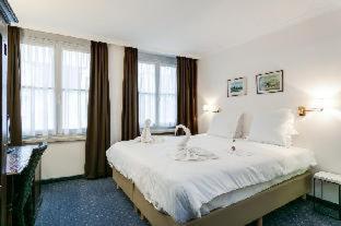 Postel nebo postele na pokoji v ubytování Hotel Bryghia