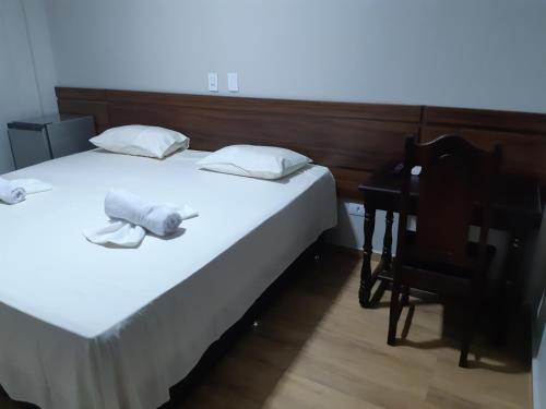 Katil atau katil-katil dalam bilik di Sleep Hotel Assis