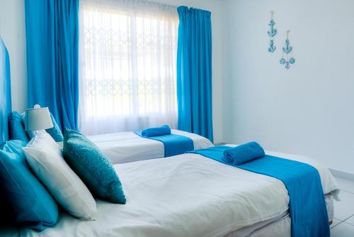 Una cama o camas en una habitación de Laguna la Crete 102