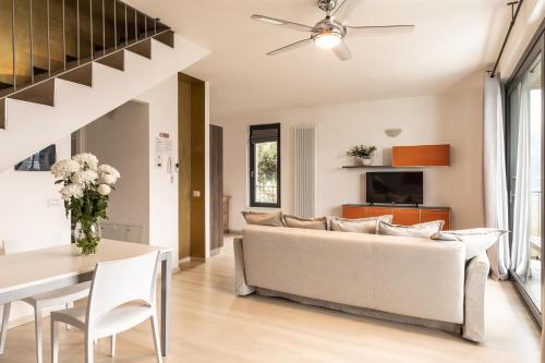 a living room with a couch and a table at Il Giardino Di Lory in Vercana
