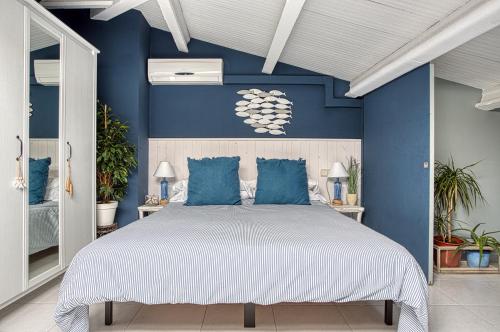 A bed or beds in a room at Vistas al Mar. Gran Terraza