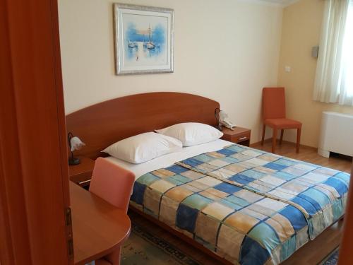 Postel nebo postele na pokoji v ubytování Apartment & Room Angerona