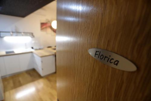 a door with a sign that says florida on it at Florek & Florica Apartment in Križevci